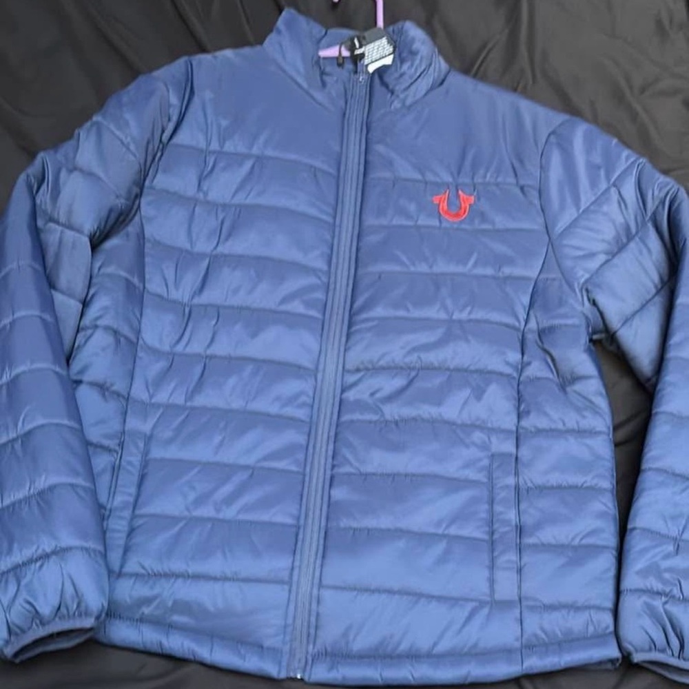 Blue Puffer Jacket with Red Logo